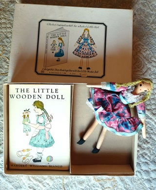 Little Wooden Doll in box.